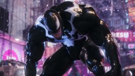 Auf dem Bild ist eine beeindruckende Darstellung von Venom zu sehen, der in einer dynamischen Pose steht. Mit seinem charakteristischen schwarzen Körper und dem auffälligen weißen Muster wirkt er bedrohlich und kraftvoll. Venoms Gesicht ist grimassierend, mit sichtbaren Zähnen und seinen großen Augen, was seine aggressive Ausstrahlung unterstreicht. Im Hintergrund sind verschwommene Lichter und Strukturen einer urbanen Umgebung zu erkennen, die dem Bild eine lebhafte Atmosphäre verleihen. Die Gesamtkomposition vermittelt ein Gefühl von Dramatik und Aufregung, passend zu dem kommenden Marvel-Spiel. Auf dem Bild ist eine beeindruckende Darstellung von Venom zu sehen, der in einer dynamischen Pose steht. Mit seinem charakteristischen schwarzen Körper und dem auffälligen weißen Muster wirkt er bedrohlich und kraftvoll. Venoms Gesicht ist grimassierend, mit sichtbaren Zähnen und seinen großen Augen, was seine aggressive Ausstrahlung unterstreicht. Im Hintergrund sind verschwommene Lichter und Strukturen einer urbanen Umgebung zu erkennen, die dem Bild eine lebhafte Atmosphäre verleihen. Die Gesamtkomposition vermittelt ein Gefühl von Dramatik und Aufregung, passend zu dem kommenden Marvel-Spiel.