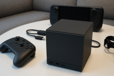 Das Bild zeigt die neue Steam Machine, ein kompaktes und stilvolles Gerät in mattem Schwarz, das auf einem weißen Tisch platziert ist. Neben der Steam Machine liegt ein schwarzer Controller, der modern und ergonomisch aussieht. Im Hintergrund sind andere Gaming-Elemente zu sehen, wie ein Handheld-Gaming-Gerät, das ebenfalls von Valve stammt. Die Szenerie vermittelt ein modernes und einladendes Gaming-Setup, das für das Wohnzimmer geeignet ist. Die Gesamtästhetik des Bildes strahlt ein Gefühl von Fortschritt und Technologie aus. Das Bild zeigt die neue Steam Machine, ein kompaktes und stilvolles Gerät in mattem Schwarz, das auf einem weißen Tisch platziert ist. Neben der Steam Machine liegt ein schwarzer Controller, der modern und ergonomisch aussieht. Im Hintergrund sind andere Gaming-Elemente zu sehen, wie ein Handheld-Gaming-Gerät, das ebenfalls von Valve stammt. Die Szenerie vermittelt ein modernes und einladendes Gaming-Setup, das für das Wohnzimmer geeignet ist. Die Gesamtästhetik des Bildes strahlt ein Gefühl von Fortschritt und Technologie aus.